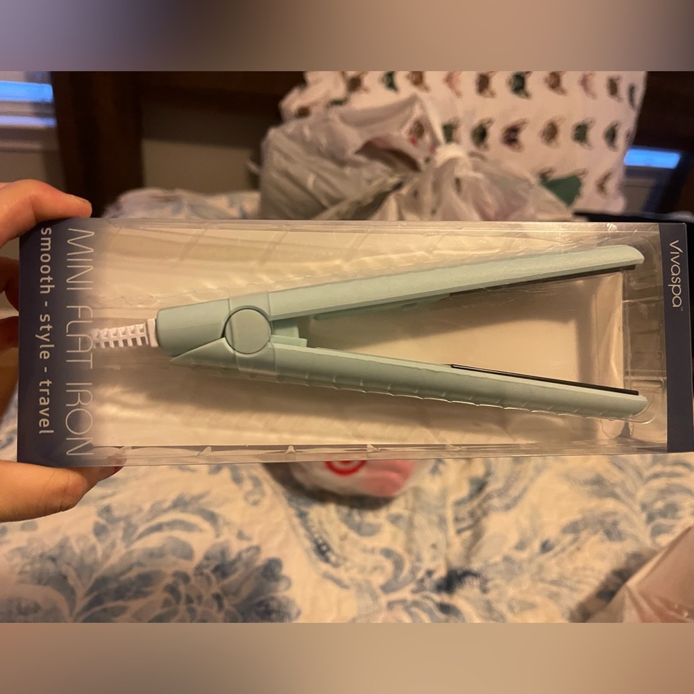 Vivaspa Miniature flat iron. Great for traveling.
